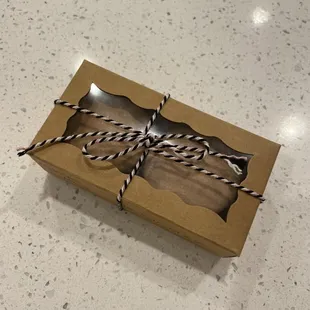 a box with a string wrapped around it