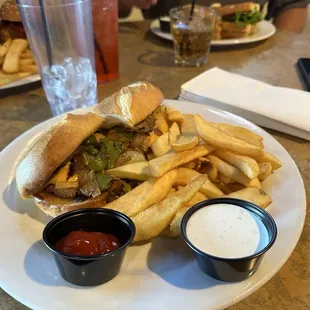 Philly Cheese Steak Sandwich (American cheese) with steak fries