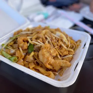 a take out container of food