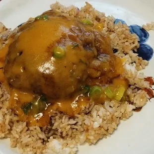 Incredible chicken egg foo young and gravy!  I lay one pattie on a platform of fried rice then add a dash of soy sauce!! Fantastic!