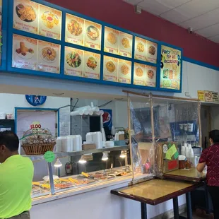 a man and a woman ordering food