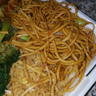 Plastic ziptie tossed in and cooked with their chow mein.  BUYER BEWARE!!!