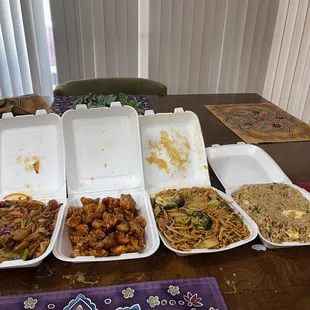 Magnolian chicken, orange chicken, veggie lo mein, and  chicken fried rice.
