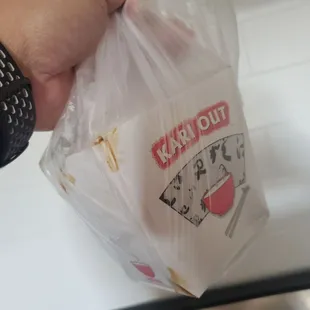 Hunan beef was wrapped to prevent leaking.