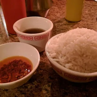 Rice with chilli sauce on side