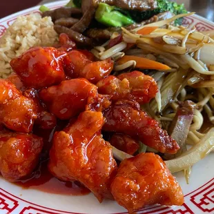 Lunch special # 4 sweet and sour chicken + broccoli beef. Large portions