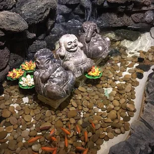 a statue of a laughing buddha