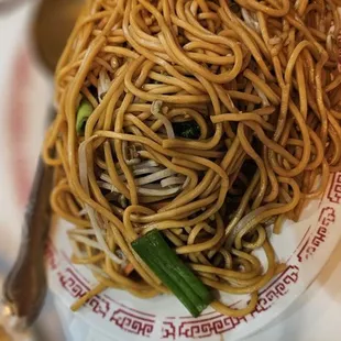 a plate of noodles on a table