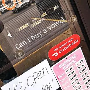 the open sign in front of the door