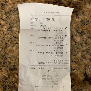 a receipt on a counter top