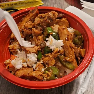 Jalapeno chicken over steamed rice. ( 2 eggrolls not shown) Total $7.08. They gave lots of meat. Worth it.