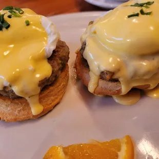 Cajun sausage Benedict with biscuit instead of English muffin! So good, a little spicy!