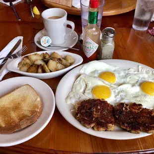 Three Egg Breakfast (Sunny-side up) + White Toast, Crawfish Sausage, + &quot;Fries&quot;. Coffee was also a decent welcome.