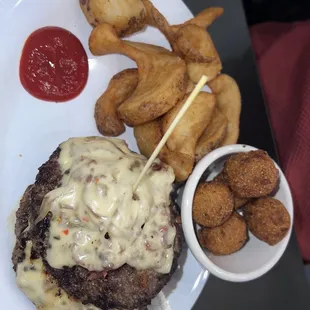 Hamburger Steak with sides of Hush Puppies &amp; French Fries