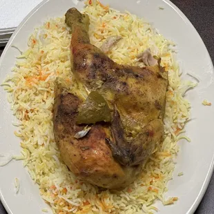 a plate of chicken and rice