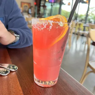 a drink with a slice of orange