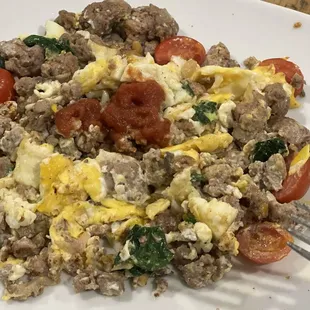 Eggs Ground Turkey spinach tomato&apos;s and sharp cheddar with their amazing salsa was amazing.