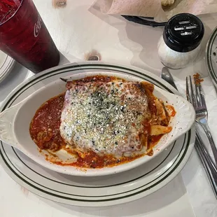 Lasagna which has ground beef, sausage and ricotta.
