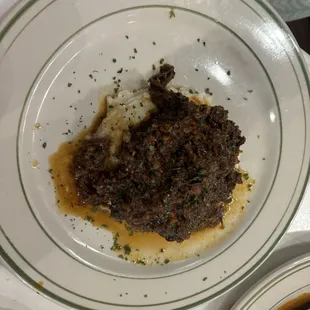 Brasato on top of potatoes