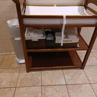 Free diapers and baby wipes in bathroom.