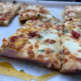 Tupelo Honey: Ricotta, Mozzarella, Gorgonzola, Calabrian Chiles, Fig Honey, Parsley