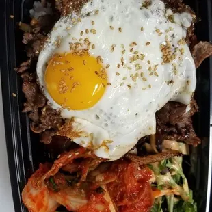 Bulgogi rice bowl with Kimchi and fried egg