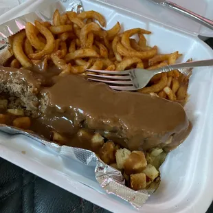 Meatloaf dinner with curly fries