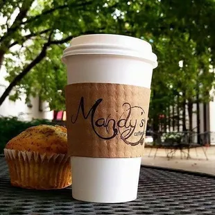 a cup of coffee and a muffin