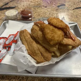 a tray of fried fish and chips