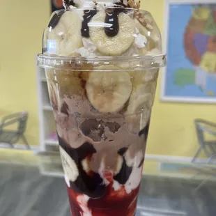 a banana split in a cup
