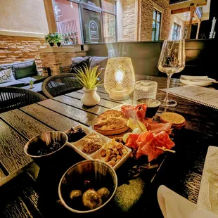 Charcuterie Board w/ Prosciutto, Salami Milano, Soppressata, Mozzarella, Aged Gouda, &amp; Whipped Goat Cheese. Seven Daughters Moscato.