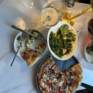 Supreme Pizza, Burrata and Strawberries salad, and antipasto skewers. What a great lunch and the atmosphere is fantastic!