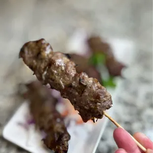 Beef stick- lemongrass, and Asian herbs pairs perfectly with sticky rice and papaya salad!
