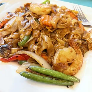 Drunken Noodles shrimp 2 spice level with a side of chili oil