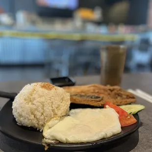 Bang-si-log - slightly breaded half dried white fish with garlic rice and two eggs
