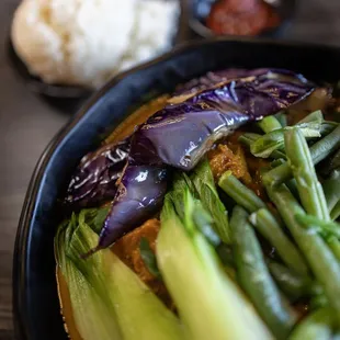 Kare Kare - Oxtail, bok choy, and eggplant in peanut butter sauce w bagoong on the side