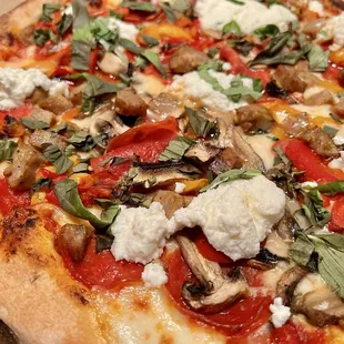 Maiale Pizza. Loved the toppings on this pizza! The flavorful sausages and creamy ricotta stood out for me.