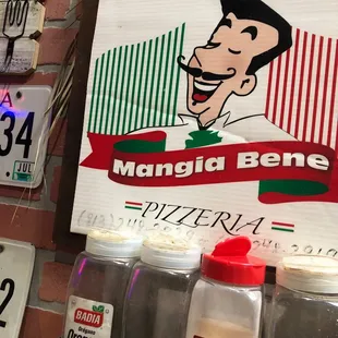 a mangia bene sign