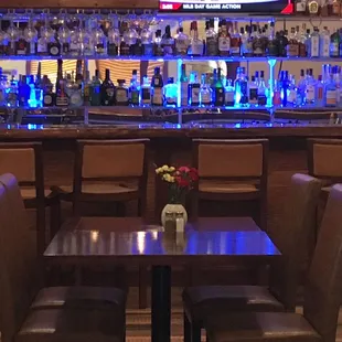 a bar with a television in the background