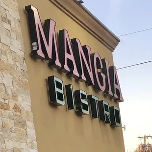 Sign at the back (or is it the front?) of the building.