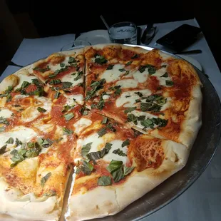 Basil margherita pizza was the better one out of the two pizza.