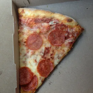 This very small slice of pizza is 4$. Yikes