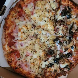 a pizza in a cardboard box