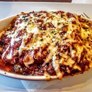 Meat Lasagna - layers of perfectly seasoned beef and a rich blend of cheeses and ricotta, topped with flavorful Sugo.