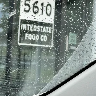 a sign in the rain