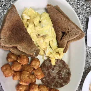 Scrambled eggs, toast, sausage and tater tots!