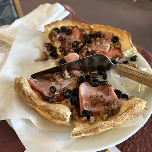 12" pizza, all meat and black olives.