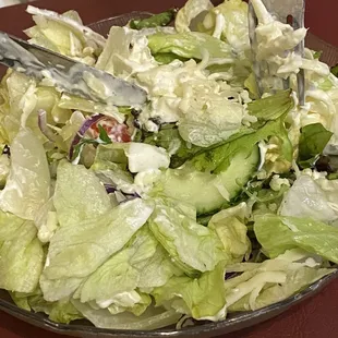 a salad in a glass bowl