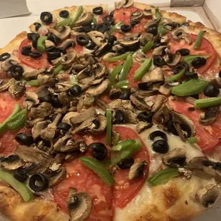 Vegetable pizza with extra mushroom