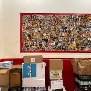 a wall full of badges